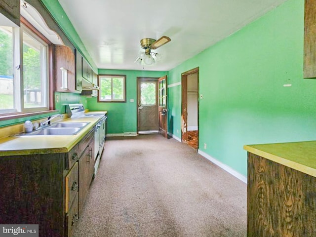 197 Coates Way, Fayette City, PA 15438 - kitchen featuring white electric stove, baseboards, a ceiling fan, and light carpet