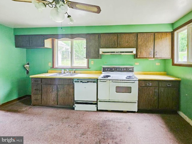 197 Coates Way, Fayette City, PA 15438 - kitchen featuring white appliances, under cabinet range hood, a sink, light countertops, and baseboards