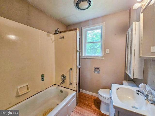 197 Coates Way, Fayette City, PA 15438 - bathroom with baseboards, toilet, wood finished floors, vanity, and shower / tub combination