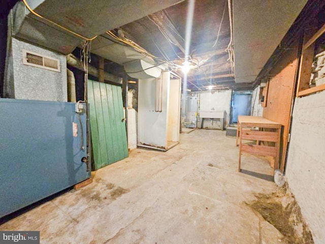 197 Coates Way, Fayette City, PA 15438 - unfinished below grade area with gas water heater and heating unit