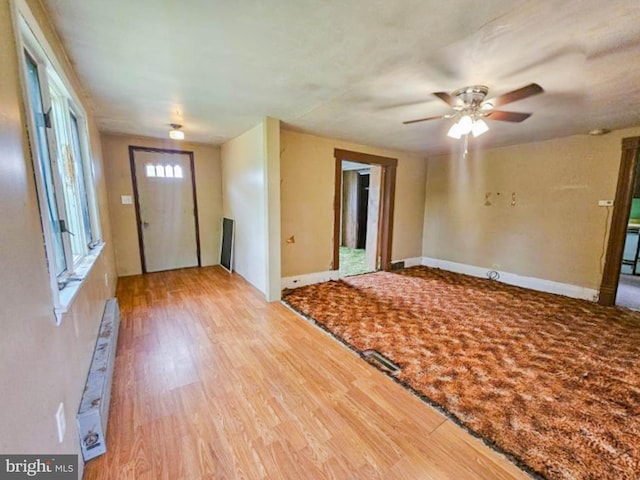 197 Coates Way, Fayette City, PA 15438 - entryway with wood finished floors, a ceiling fan, and baseboards