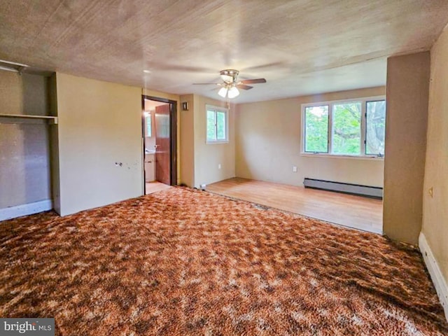 197 Coates Way, Fayette City, PA 15438 - unfurnished bedroom featuring a baseboard heating unit and a ceiling fan