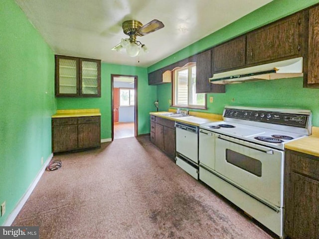 197 Coates Way, Fayette City, PA 15438 - kitchen with under cabinet range hood, white appliances, baseboards, and dark brown cabinetry
