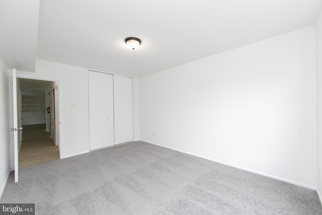 275 Green St Unit 4H5, Beverly, NJ 08010 - unfurnished bedroom with carpet flooring, a closet, and baseboards