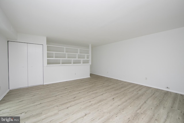 275 Green St Unit 4H5, Beverly, NJ 08010 - spare room featuring light wood-style flooring and baseboards