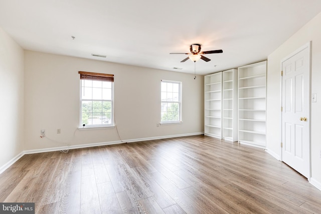 1915 Bulrush Ct, Odenton, MD 21113 - spare room featuring ceiling fan, wood finished floors, and baseboards