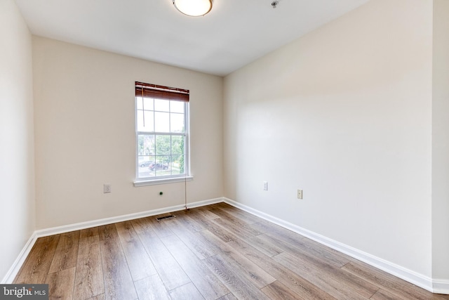 1915 Bulrush Ct, Odenton, MD 21113 - unfurnished room featuring wood finished floors and baseboards