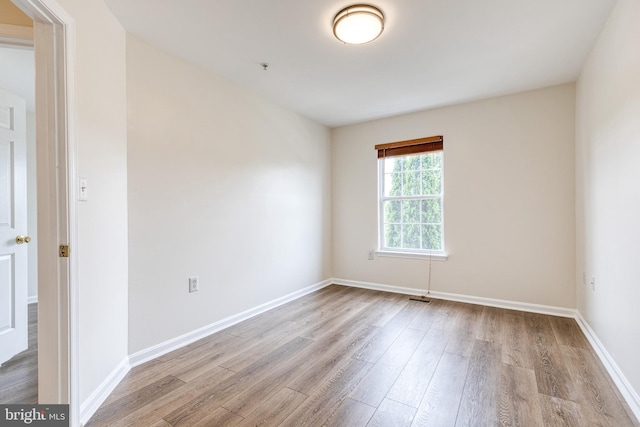 1915 Bulrush Ct, Odenton, MD 21113 - unfurnished room featuring wood finished floors, baseboards, and a pendent fire sprinkler