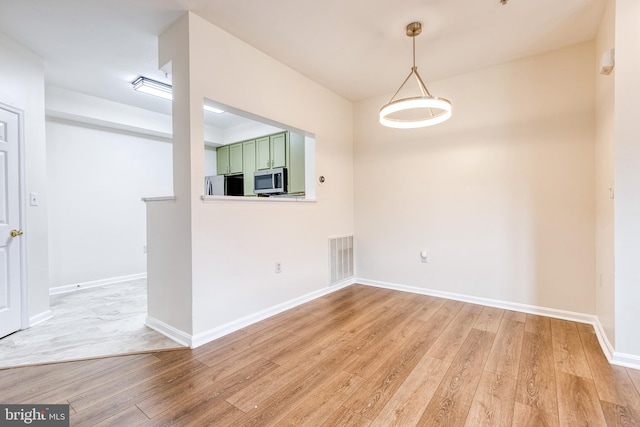 1915 Bulrush Ct, Odenton, MD 21113 - unfurnished room with light wood-style flooring and baseboards