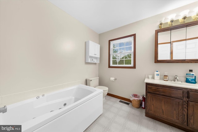 2332 Noel Cir, Pottstown, PA 19464 - bathroom with a jetted tub, tile patterned floors, baseboards, toilet, and vanity