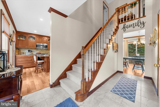 2332 Noel Cir, Pottstown, PA 19464 - staircase with baseboards, recessed lighting, and a chandelier