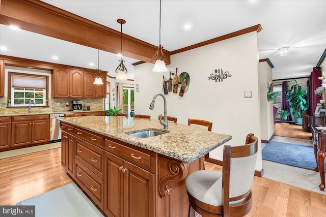 2332 Noel Cir, Pottstown, PA 19464 - kitchen with a sink, dishwasher, a kitchen breakfast bar, a kitchen island with sink, and ornamental molding
