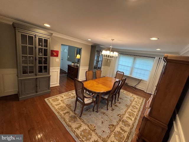 1041 Bobwhite Dr, Cherry Hill, NJ 08003 - dining area with a chandelier, ornamental molding, dark wood finished floors, a wainscoted wall, and a decorative wall