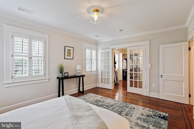 4405 Underwood Rd, Baltimore, MD 21218 - bedroom with french doors, wood finished floors, crown molding, baseboards, and a spacious closet