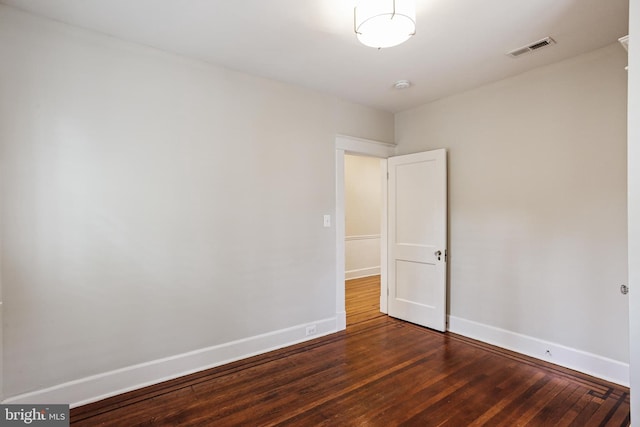 4405 Underwood Rd, Baltimore, MD 21218 - unfurnished room with baseboards, wood finished floors, and a smoke detector