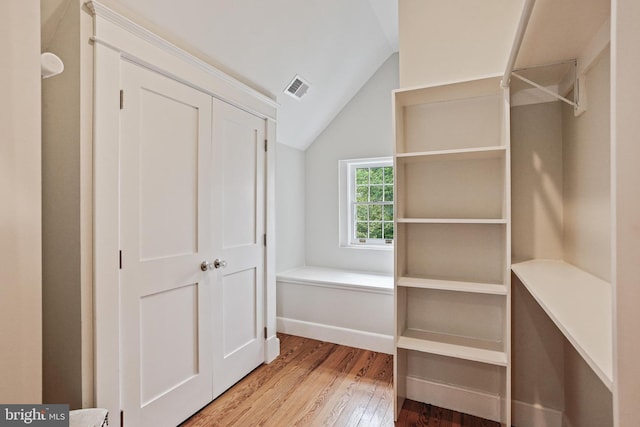 4405 Underwood Rd, Baltimore, MD 21218 - spacious closet with wood finished floors and vaulted ceiling