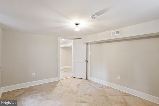 4405 Underwood Rd, Baltimore, MD 21218 - spare room featuring baseboards and a smoke detector