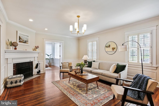 4405 Underwood Rd, Baltimore, MD 21218 - living area with dark wood-style flooring, a chandelier, crown molding, a fireplace with flush hearth, and recessed lighting