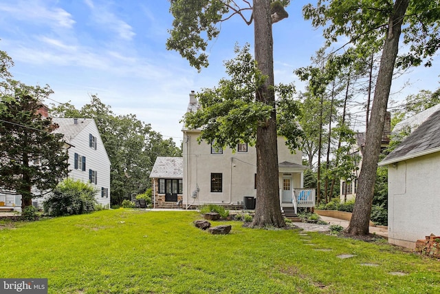 4405 Underwood Rd, Baltimore, MD 21218 - view of green lawn featuring central AC