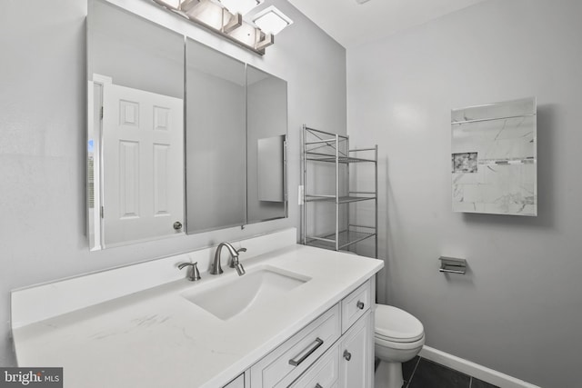 44138 Allderwood Ter, Ashburn, VA 20147 - full bathroom featuring vanity, toilet, tile patterned flooring, a shower, and baseboards