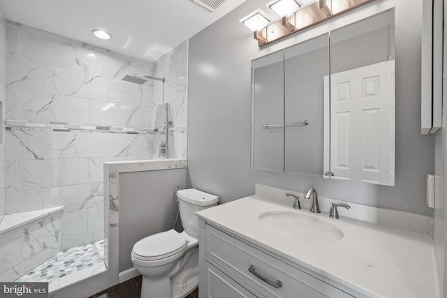 44138 Allderwood Ter, Ashburn, VA 20147 - bathroom with vanity, a marble finish shower, and toilet