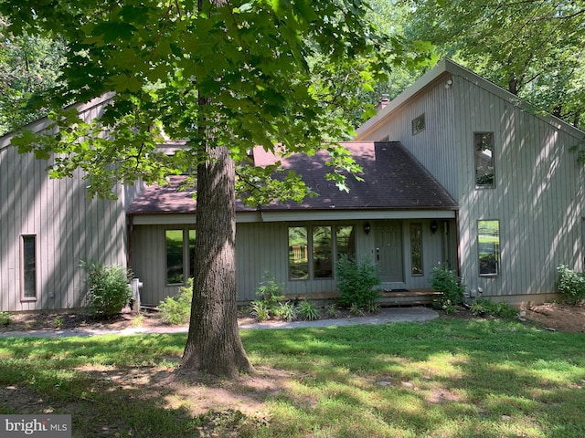 4105 Holbrook Rd, Randallstown, MD 21133 - mid-century inspired home with a front yard and a shingled roof