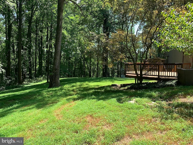 4105 Holbrook Rd, Randallstown, MD 21133 - view of grassy yard featuring a wooden deck
