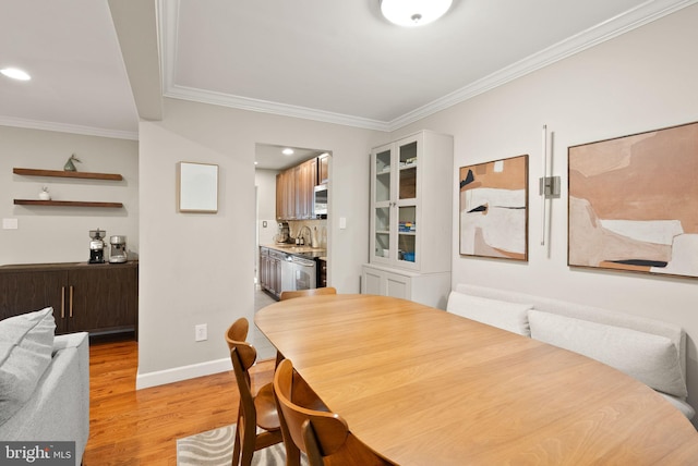 2455 Alsop Ct, Reston, VA 20191 - dining room with light wood-type flooring, ornamental molding, baseboards, and recessed lighting