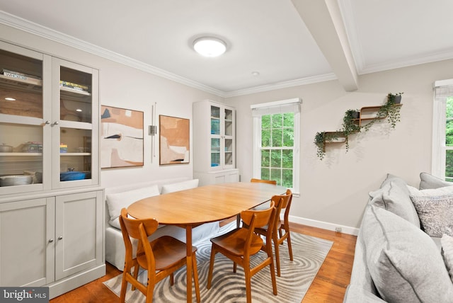 2455 Alsop Ct, Reston, VA 20191 - dining room with light wood finished floors, ornamental molding, and baseboards