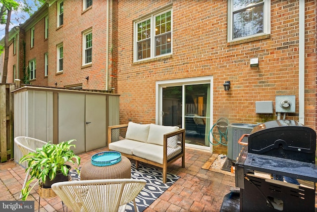 2455 Alsop Ct, Reston, VA 20191 - view of patio / terrace featuring cooling unit, outdoor lounge area, a storage unit, and a grill