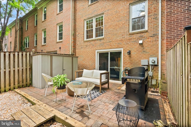 2455 Alsop Ct, Reston, VA 20191 - fenced backyard featuring a patio area and an outdoor living space