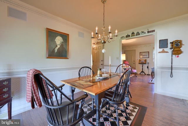 2 Kings Ct, Gordonville, PA 17529 - dining space with wood finished floors, a chandelier, ornamental molding, and a wainscoted wall