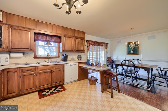 2 Kings Ct, Gordonville, PA 17529 - kitchen with a chandelier, white appliances, a sink, light floors, and light countertops