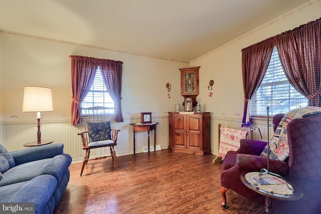 2 Kings Ct, Gordonville, PA 17529 - living area with wainscoting, healthy amount of natural light, and wood finished floors