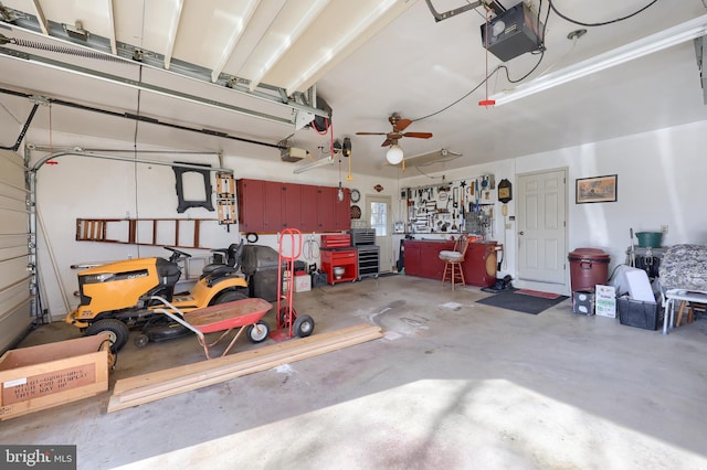 2 Kings Ct, Gordonville, PA 17529 - garage featuring a garage door opener, ceiling fan, and a workshop area