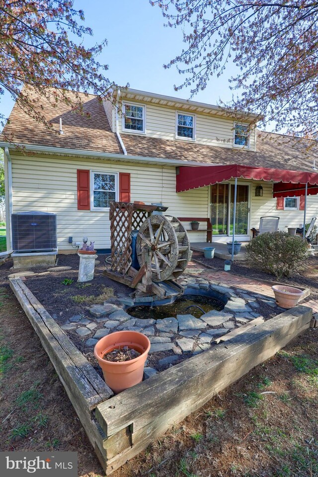 2 Kings Ct, Gordonville, PA 17529 - back of house featuring central air condition unit and a patio area