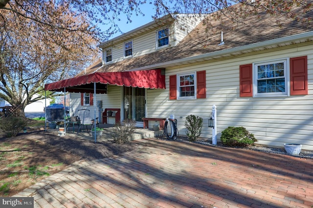 2 Kings Ct, Gordonville, PA 17529 - view of front of house featuring a patio and a shingled roof