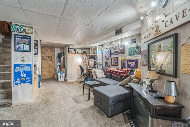 2609 E Monmouth St, Philadelphia, PA 19134 - living room featuring carpet, stairway, a drop ceiling, and wooden walls