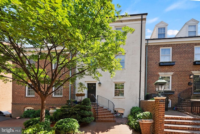 116 Cameron Mews, Alexandria, VA 22314 - view of property featuring brick siding