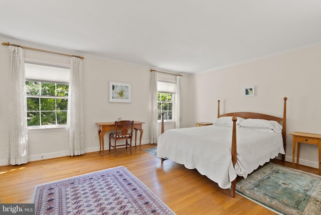 116 Cameron Mews, Alexandria, VA 22314 - bedroom featuring wood finished floors, ornamental molding, and baseboards