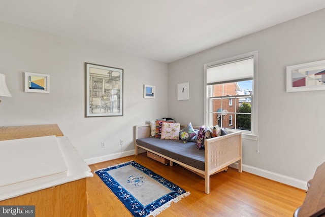 116 Cameron Mews, Alexandria, VA 22314 - bedroom featuring baseboards and wood finished floors