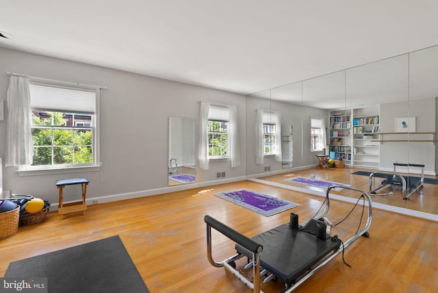 116 Cameron Mews, Alexandria, VA 22314 - living room featuring wood finished floors and baseboards