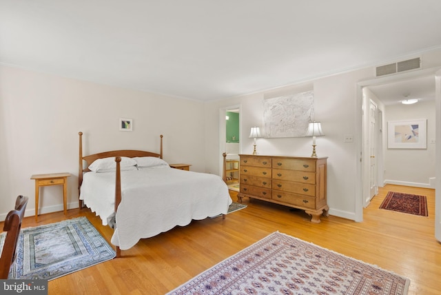 116 Cameron Mews, Alexandria, VA 22314 - bedroom with wood finished floors and baseboards