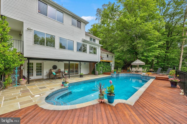 10200 Souza Ln, Manassas, VA 20111 - outdoor pool with french doors, a deck, and a patio