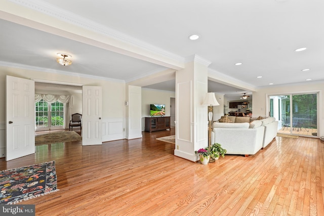 10200 Souza Ln, Manassas, VA 20111 - living area featuring ornamental molding, light wood-style flooring, a wainscoted wall, a decorative wall, and recessed lighting