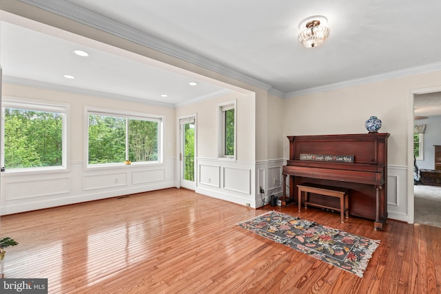 10200 Souza Ln, Manassas, VA 20111 - sitting room with hardwood / wood-style flooring, a decorative wall, ornamental molding, wainscoting, and recessed lighting