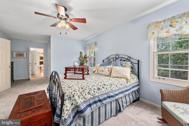10200 Souza Ln, Manassas, VA 20111 - carpeted bedroom featuring baseboards and ceiling fan