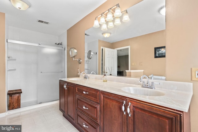 10200 Souza Ln, Manassas, VA 20111 - bathroom featuring double vanity, a stall shower, and tile patterned floors