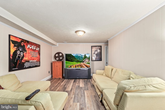 10200 Souza Ln, Manassas, VA 20111 - living area featuring wood finished floors, ornamental molding, and a textured ceiling