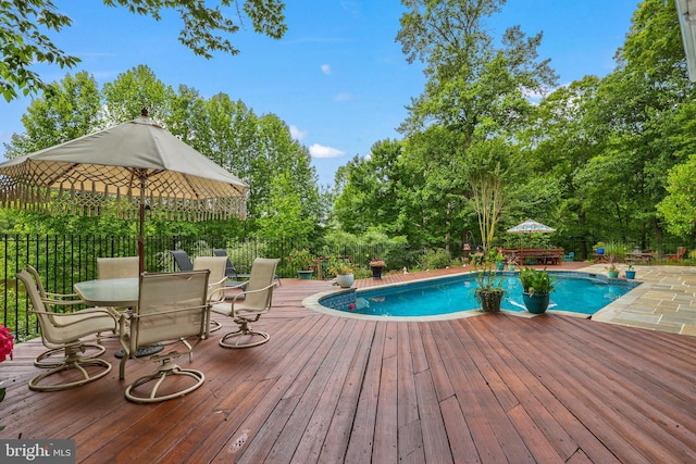 10200 Souza Ln, Manassas, VA 20111 - view of swimming pool with a deck, outdoor dining space, and view of scattered trees